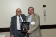 Dr. Nagib Callaos, General Chair, giving Dr. Leonid Perlovsky an award "In Appreciation for Delivering a Great Plenary Keynote Address and the Outstanding Workshop 'Toward Physics of The Mind'"